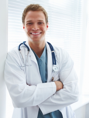 Closeup portrait of a happy young doctor